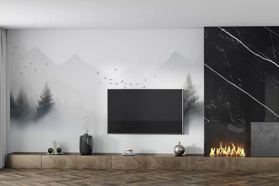 Carta da parati nature Sereno bosco invernale sul fianco di una montagna nei toni del bianco e del grigio chiaro 