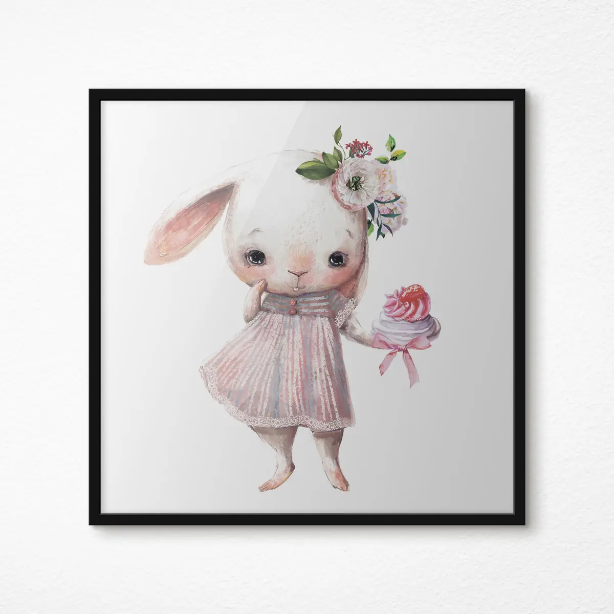 Poster Un simpatico coniglietto con un dolce dolcetto f35046